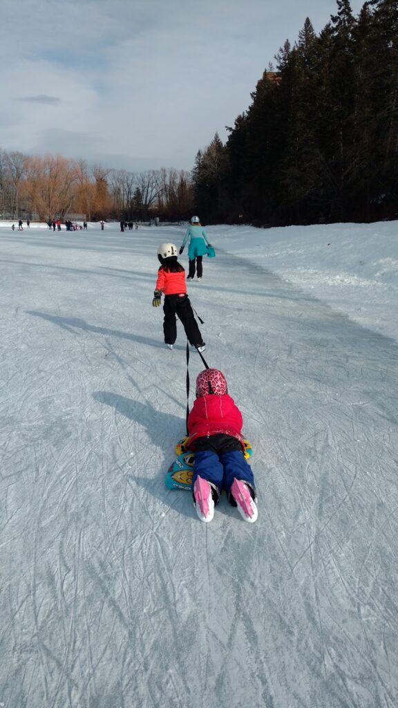 ice-skating-towing-sled